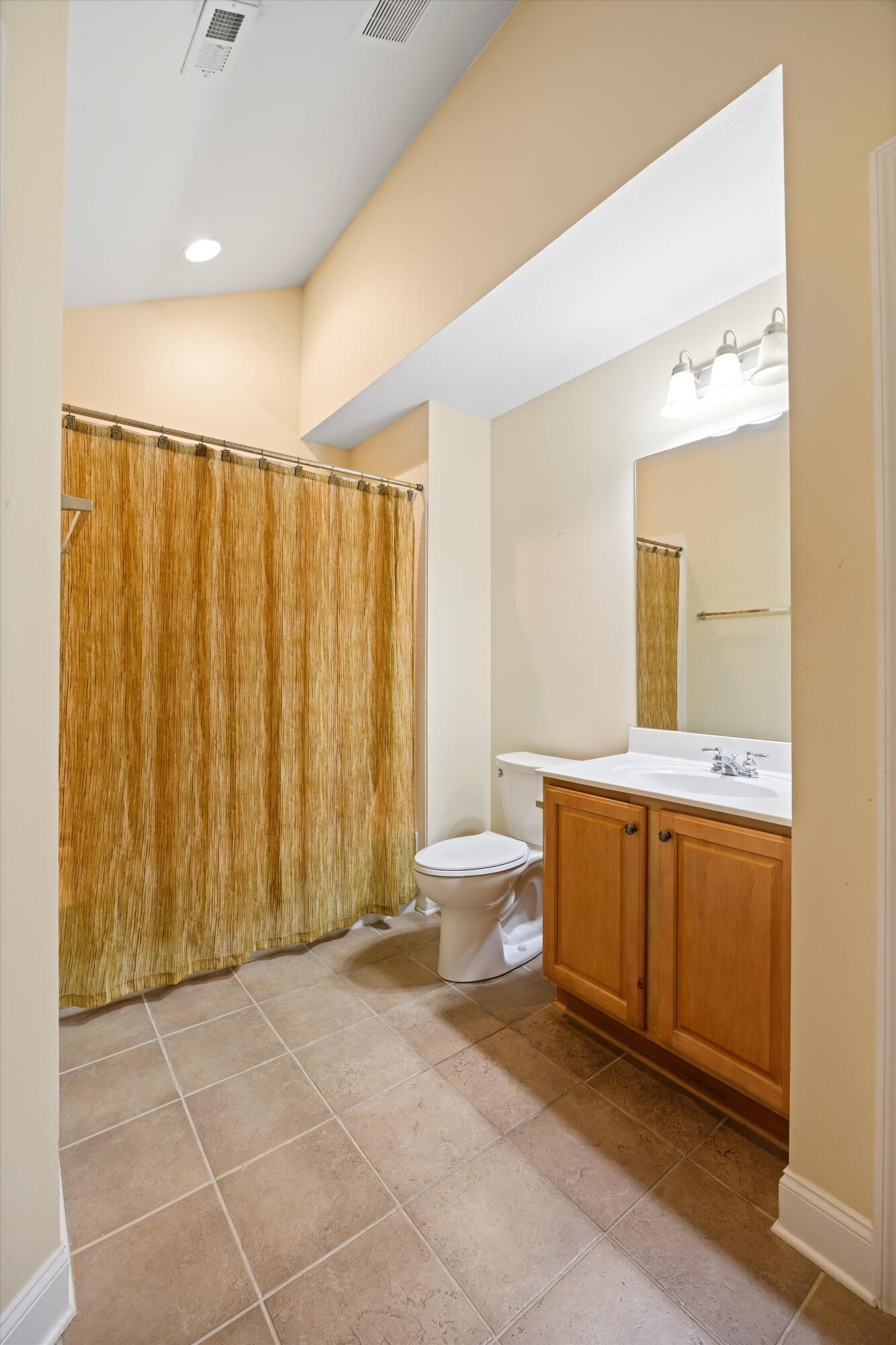 2457 Baskette Way Chattanooga, TN 37421 - Photo 23 of 24 a spacious bathroom with a granite countertop sink and a mirror