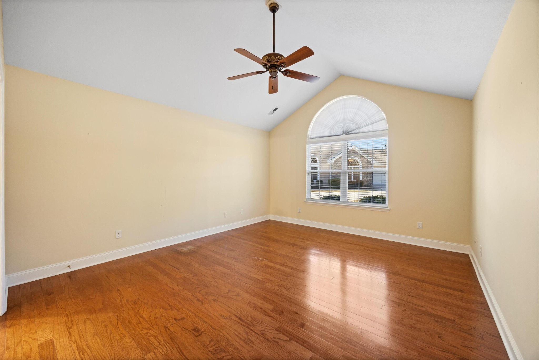 2457 Baskette Way Chattanooga, TN 37421 - Photo 4 of 24 wooden floor in an empty room with a window