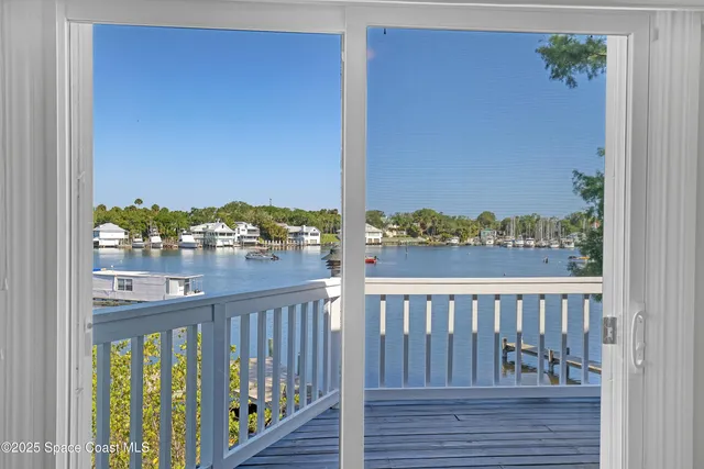 a spacious bathroom with a granite countertop sink a mirror and a bathtub