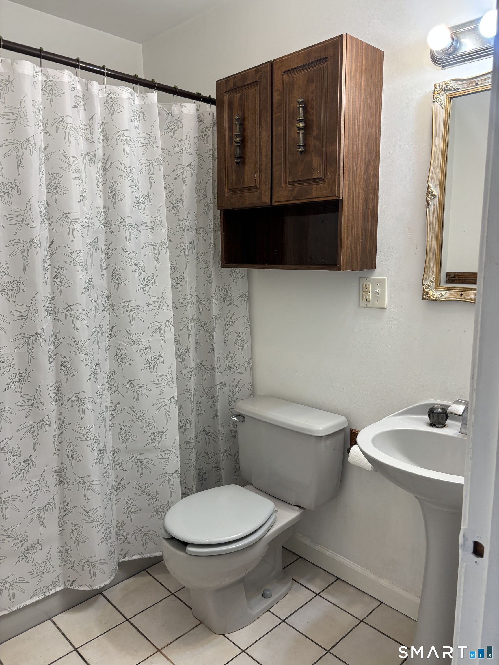 10 Collins Street, Unit 10D Hamden, CT 06514 - Photo 9 of 13 Bathroom with tub/shower combo