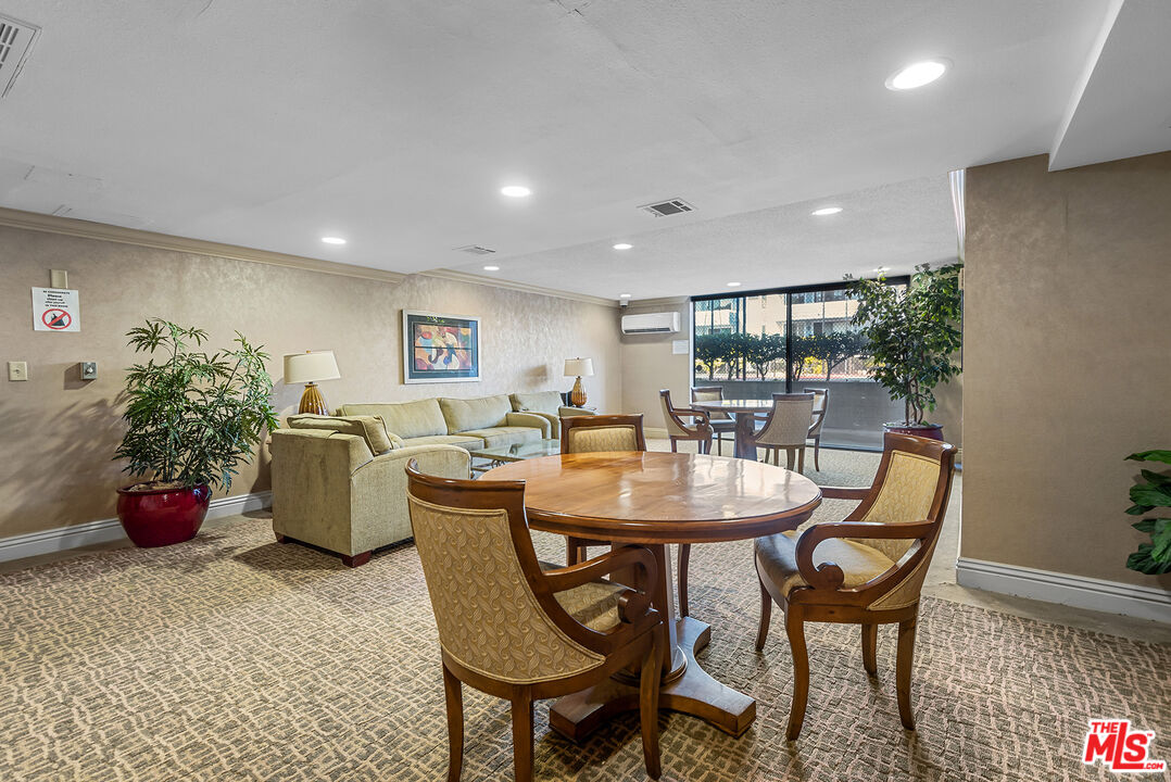 311 Bora Bora Way, Unit 3207 Marina del Rey, CA 90292 - Photo 45 of 54 a dining room with furniture and potted plants