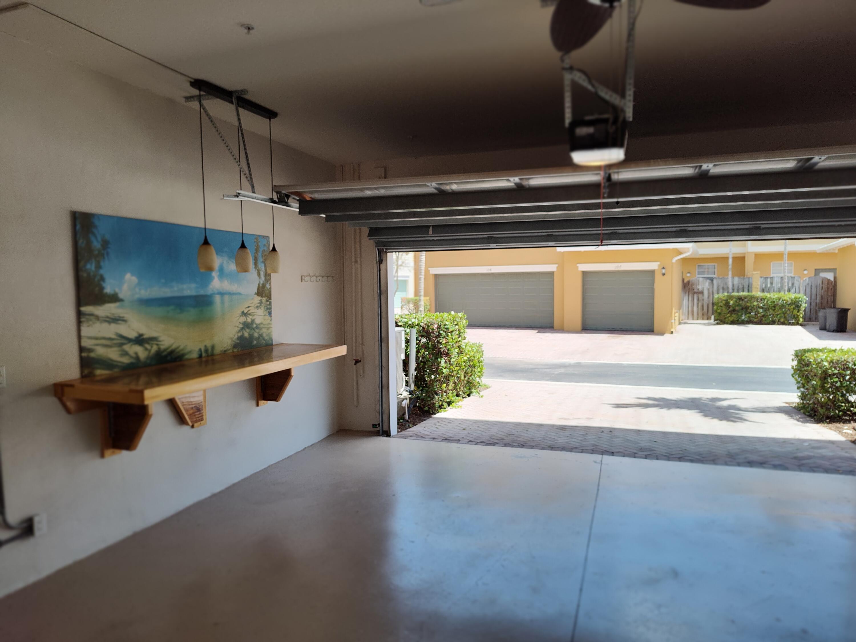 265 Indian Creek Parkway, Unit 102 Jupiter, FL 33458 - Photo 14 of 21 Garage