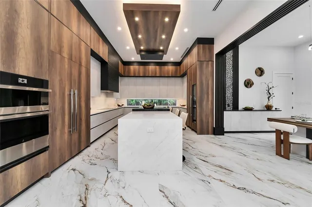 a view of a kitchen with a sink