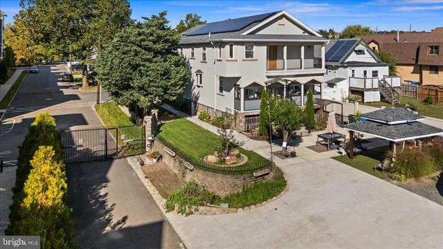an aerial view of a house with garden
