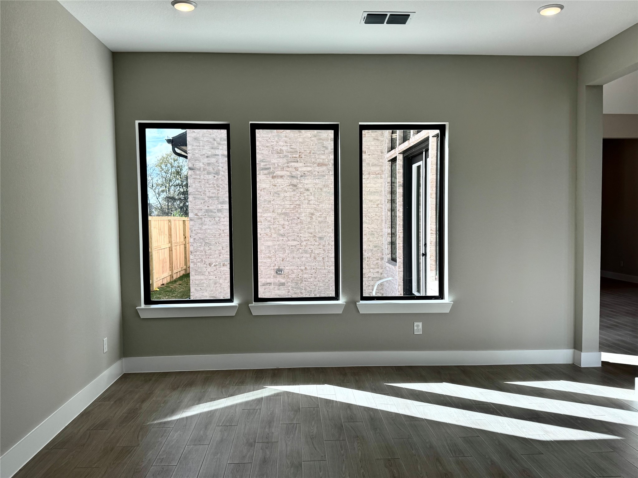 4402 Crossfield Road Fulshear, TX 77441 - Photo 11 of 23 The Game Room also has Windows that lookout to the Breakfast Room Patio as well!!