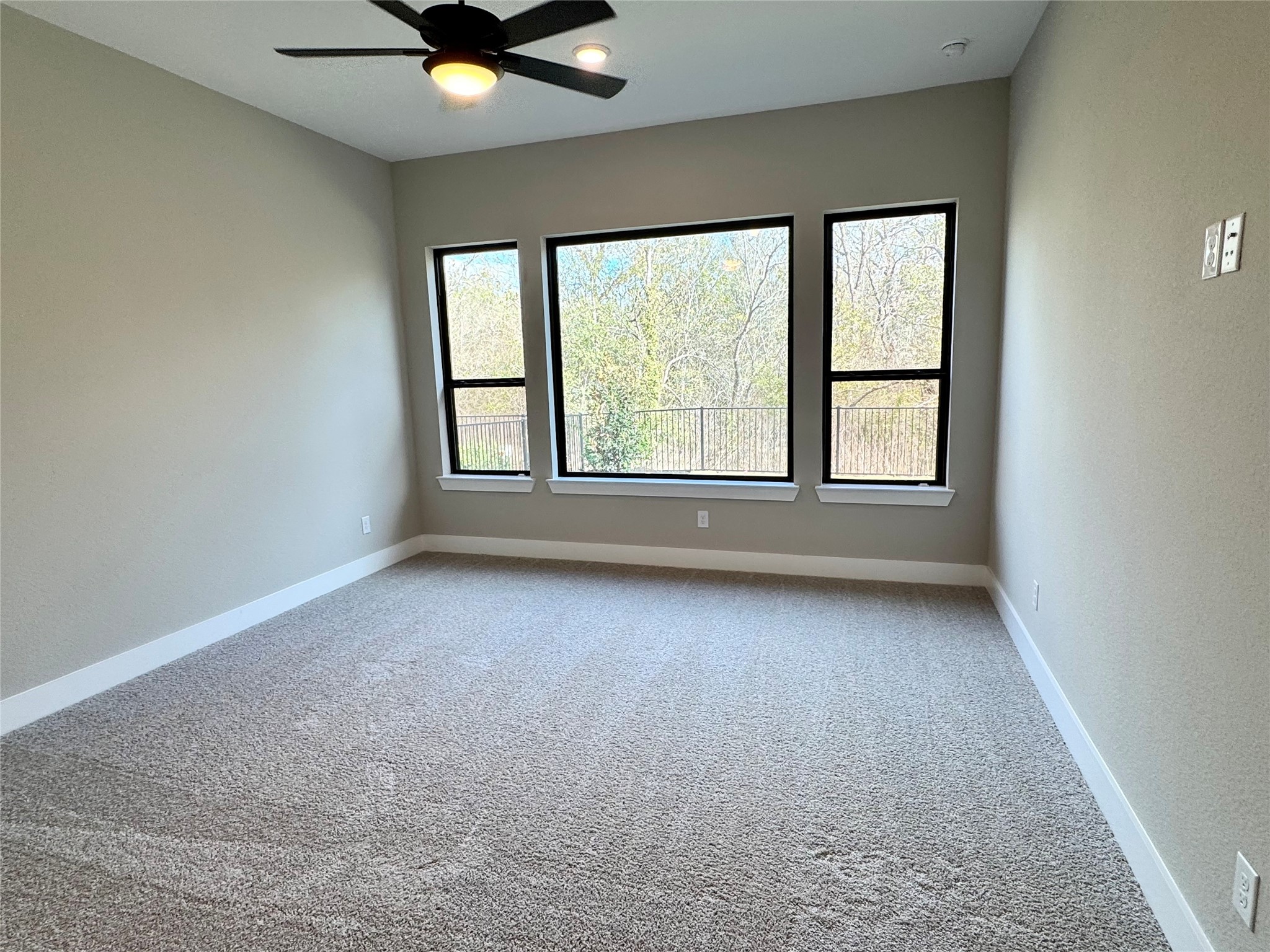 4402 Crossfield Road Fulshear, TX 77441 - Photo 12 of 23 Main Bedroom with Large windows in Main Bedroom no neighborhoods behind