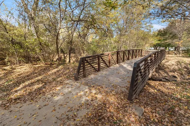a view of stairs and trees in the background