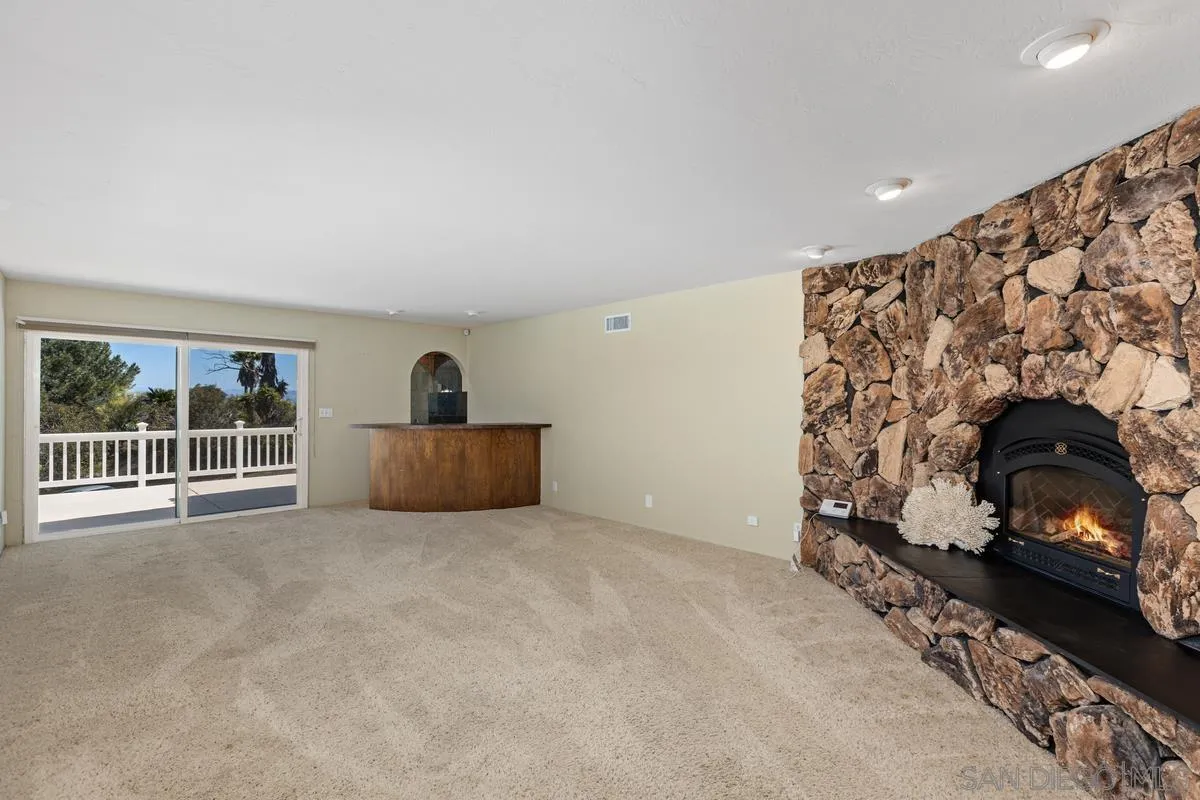 3049 Millar Ranch Road Spring Valley, CA 91978 - Photo 38 of 71 a view of an empty room and a fireplace