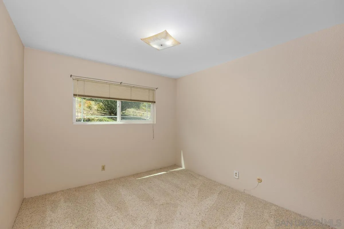 3049 Millar Ranch Road Spring Valley, CA 91978 - Photo 46 of 71 an empty room with a window
