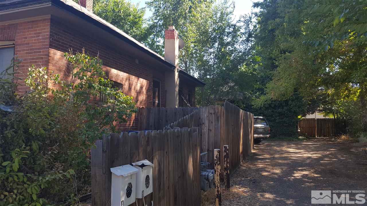 1120 Jones Street Reno, NV 89503 - Photo 13 of 25 a view of a wooden fence next to a yard