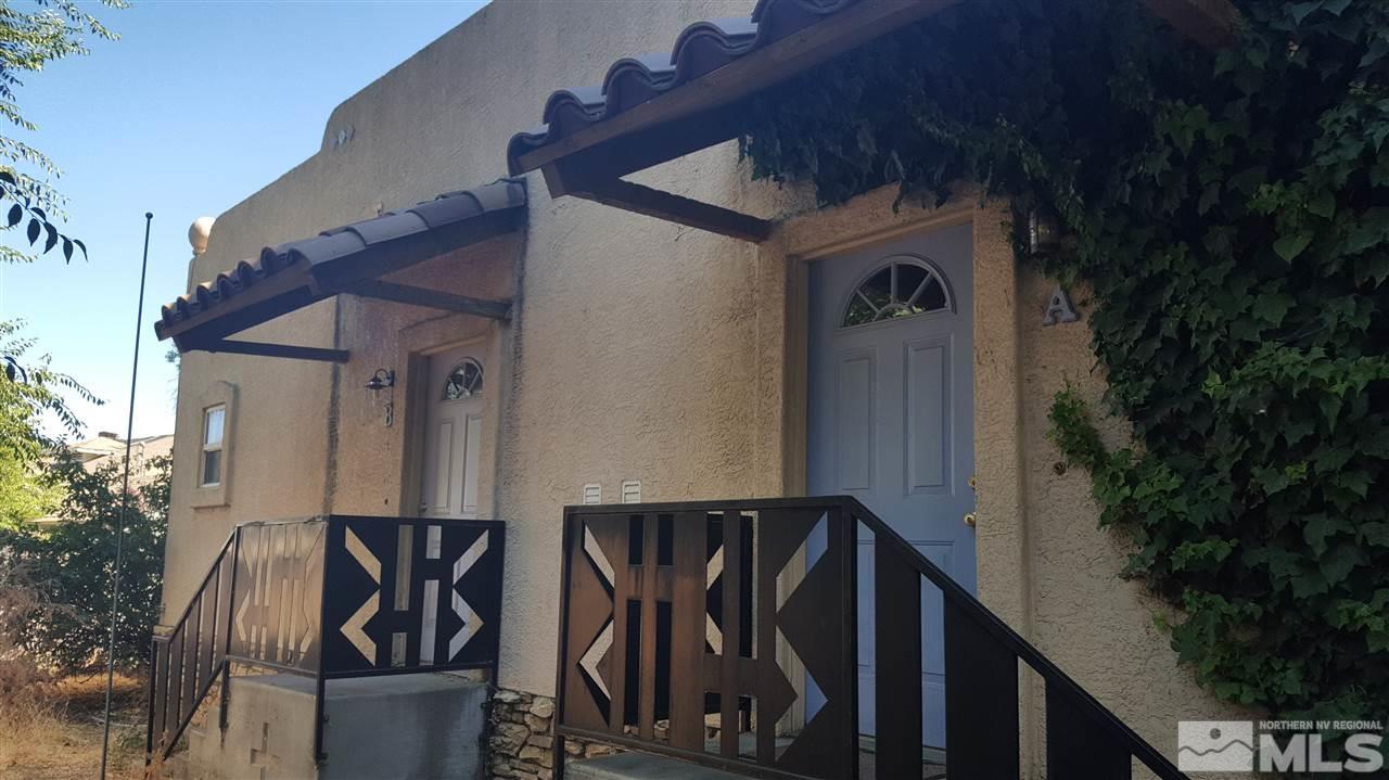 1120 Jones Street Reno, NV 89503 - Photo 15 of 25 a front view of a house with barbeque and trees