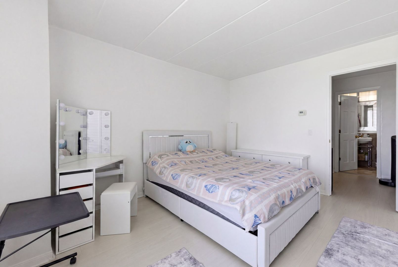 1 Renaissance Place, Unit 816 Palatine, IL 60067 - Photo 10 of 23 a bedroom with a bed and chair