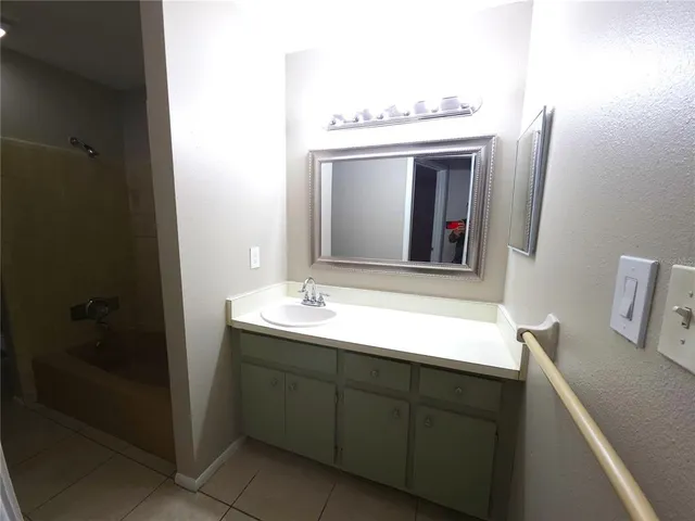 a white toilet sitting next to a window