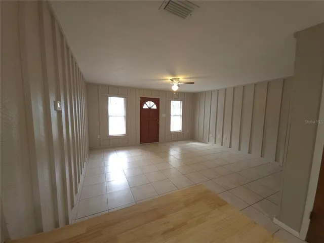 a kitchen with a stove sink and refrigerator