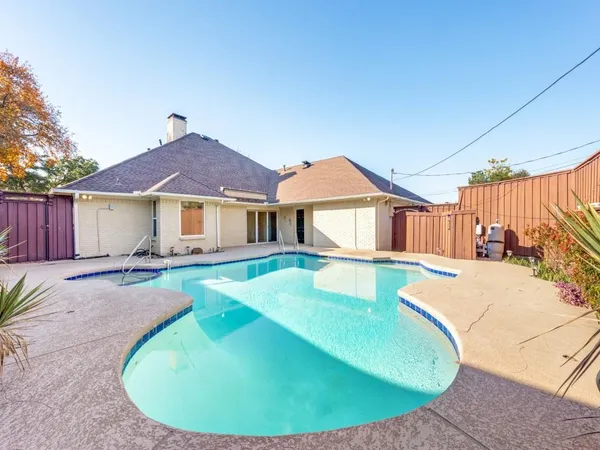 a view of a house with a swimming pool