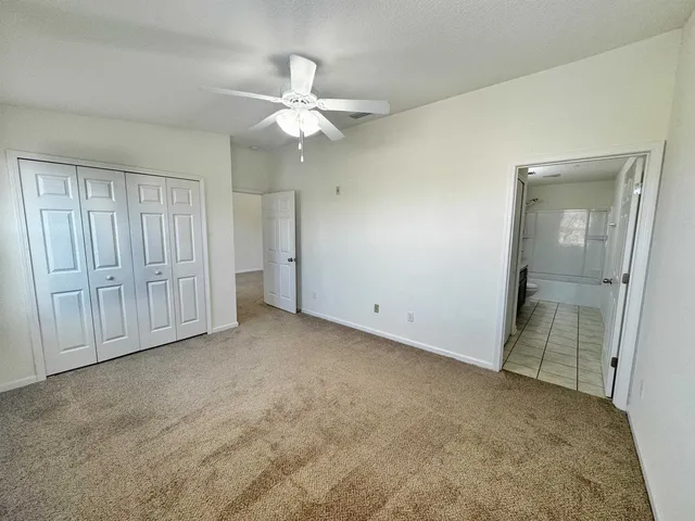 an empty room with a mirror