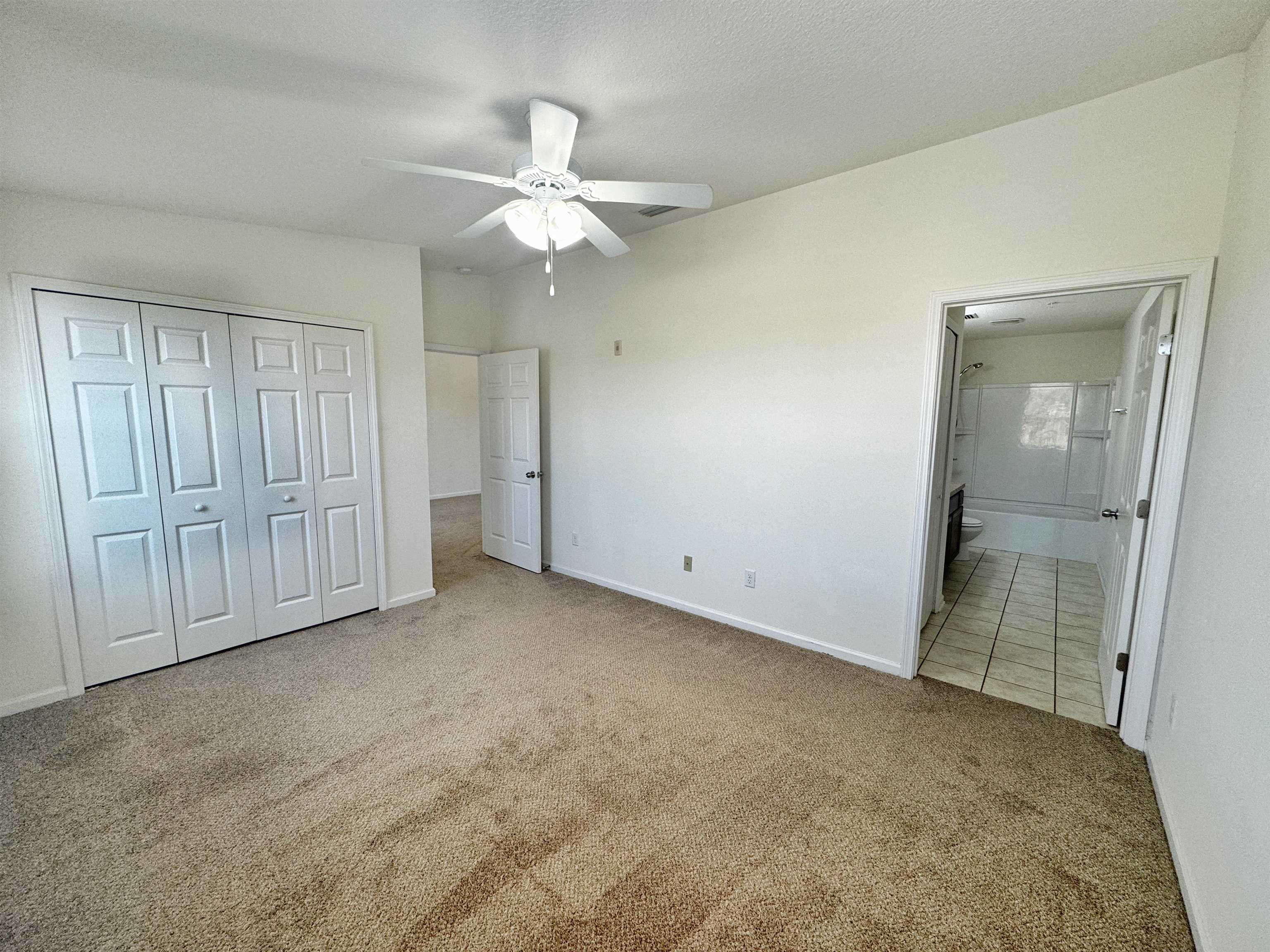 2261 Golden Lake Loop St. Augustine, FL 32084 - Photo 21 of 43 an empty room with a mirror