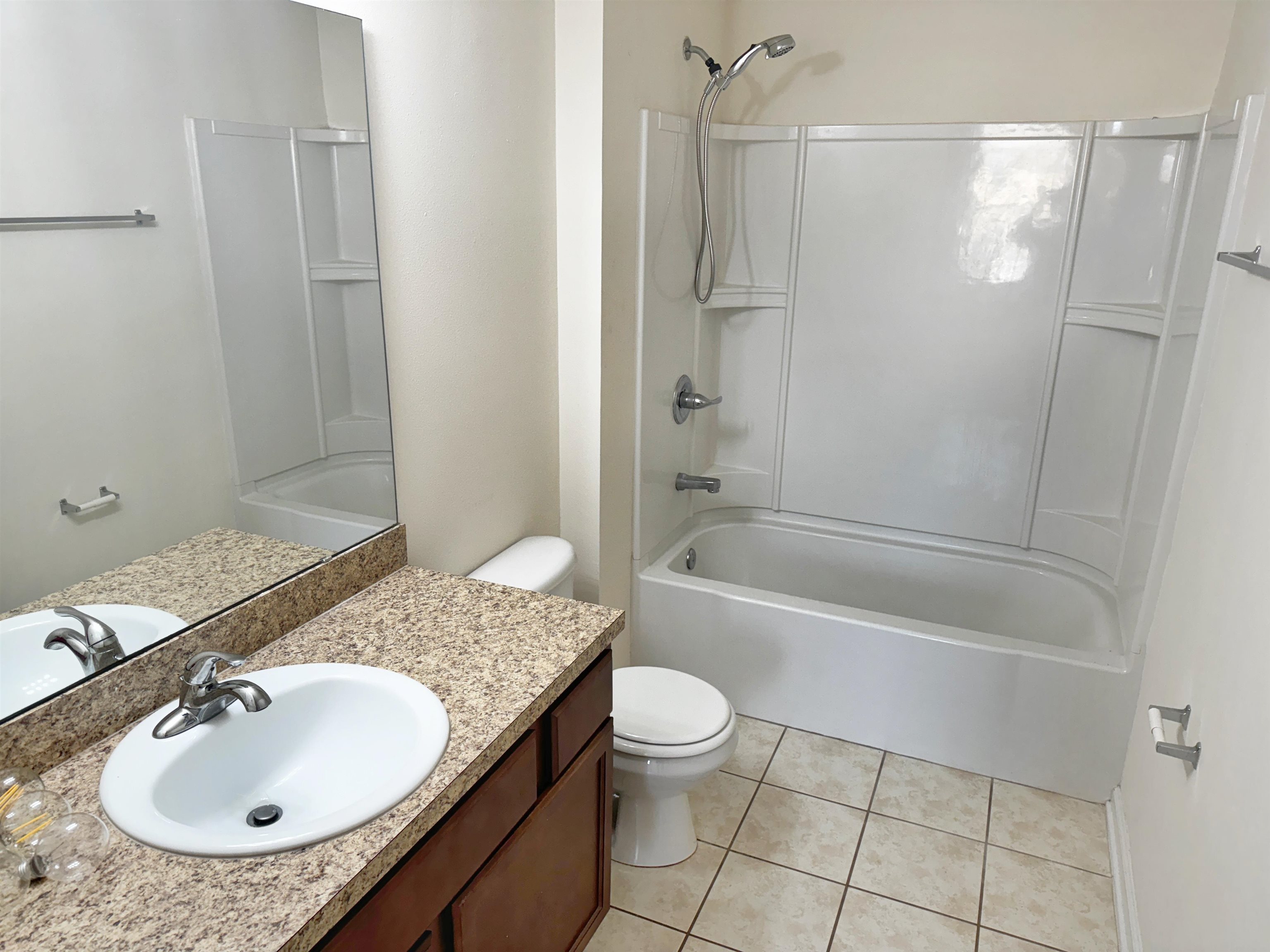 2261 Golden Lake Loop St. Augustine, FL 32084 - Photo 26 of 43 a bathroom with a sink toilet tub and shower