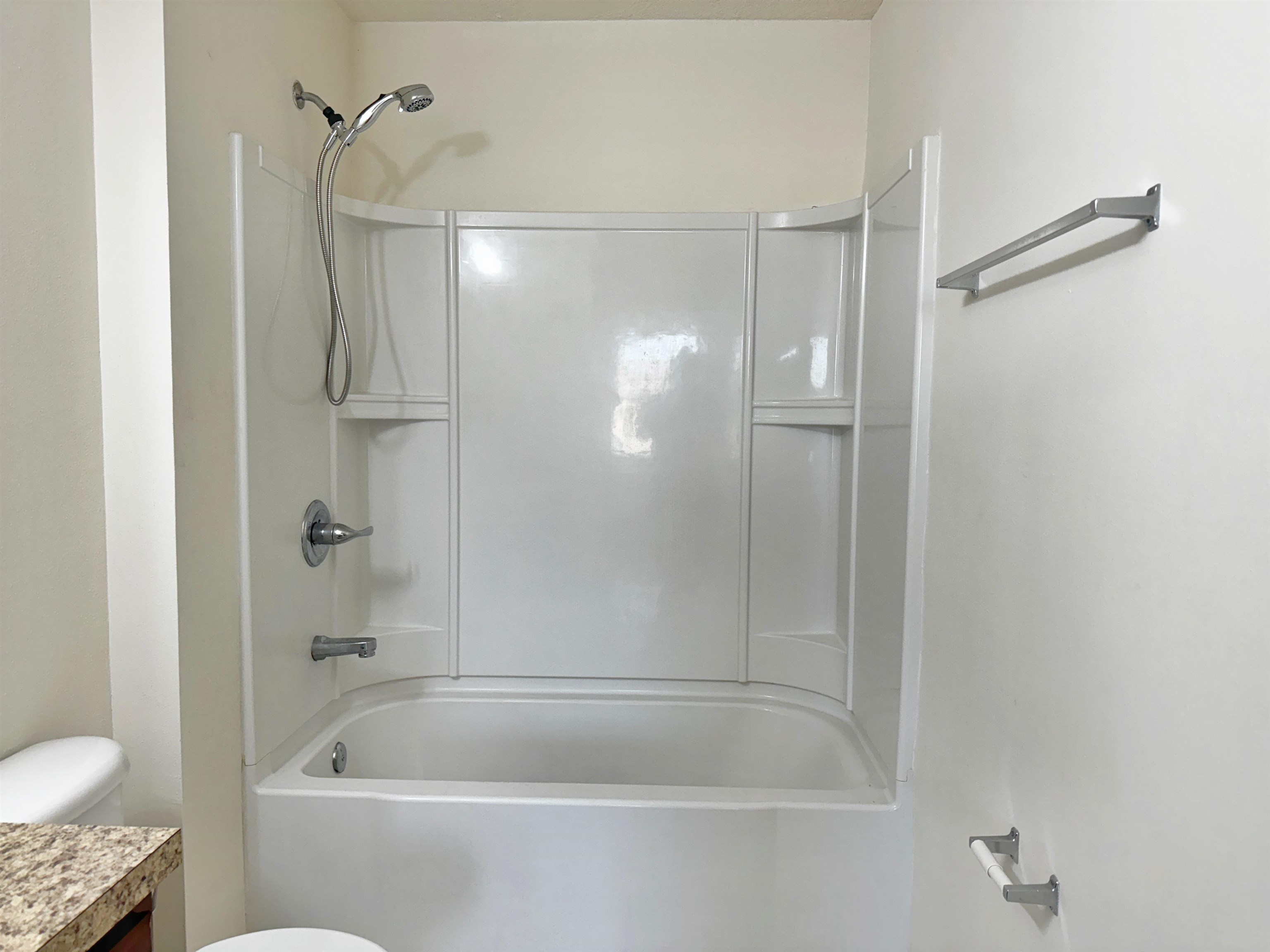 2261 Golden Lake Loop St. Augustine, FL 32084 - Photo 28 of 43 a bathroom with a granite countertop bathtub shower and toilet