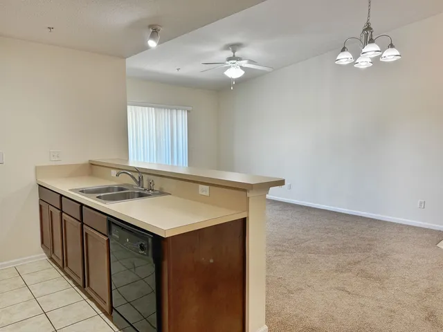 a bathroom with a sink a vanity and a mirror