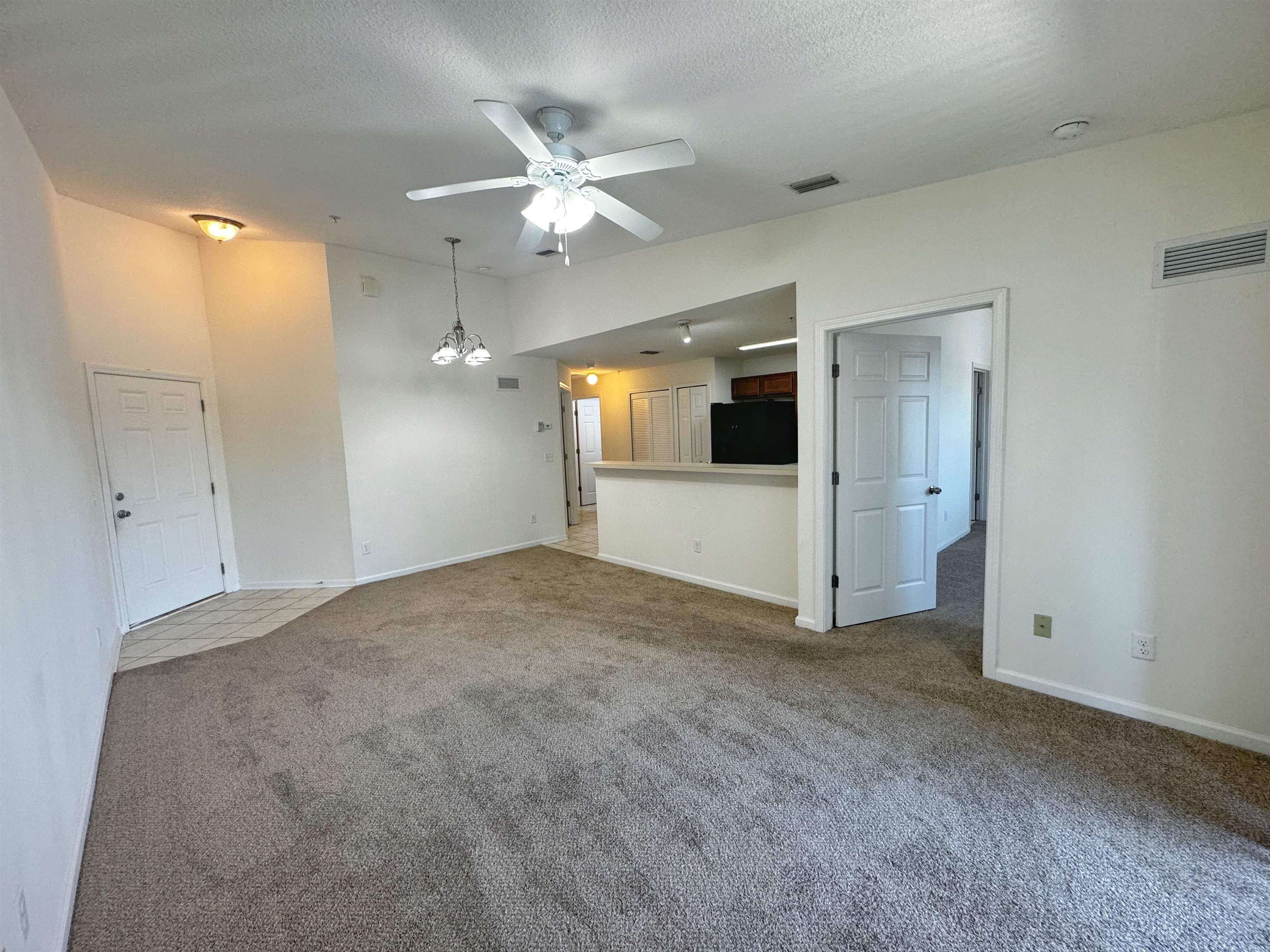 2261 Golden Lake Loop St. Augustine, FL 32084 - Photo 9 of 43 an empty room with a bathroom and a mirror