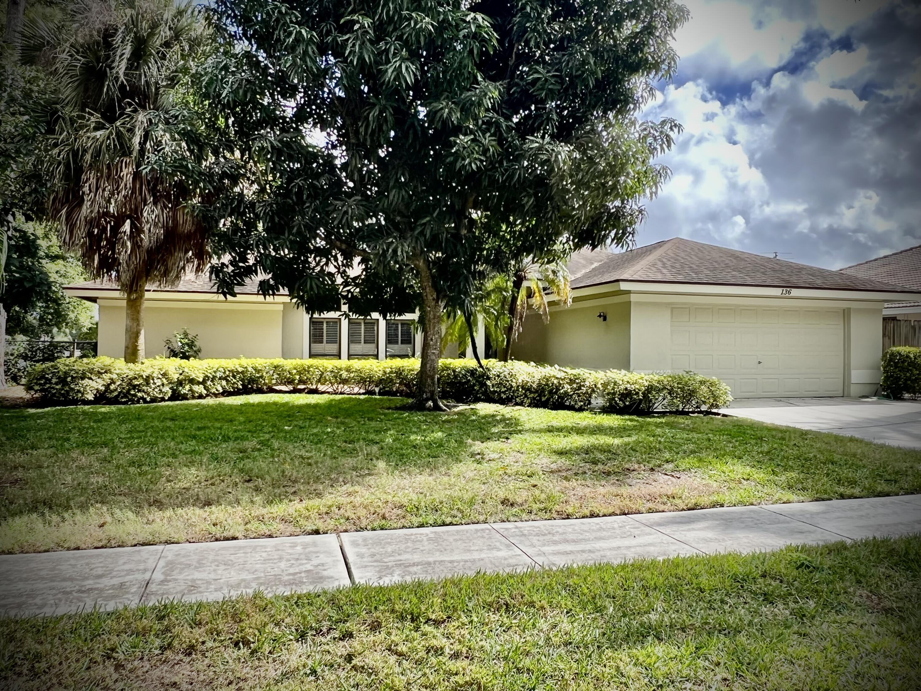 136 Park Road North Royal Palm Beach, FL 33411 - Photo 1 of 1 FRONT