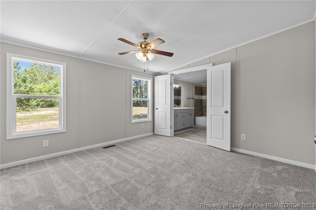 1770 Ashemont Road Aberdeen, NC 28315 - Photo 11 of 29 a view of an empty room with a window