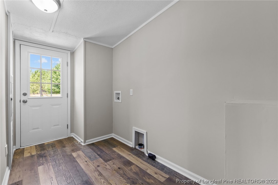 1770 Ashemont Road Aberdeen, NC 28315 - Photo 18 of 29 a view of room with hardwood floor and window