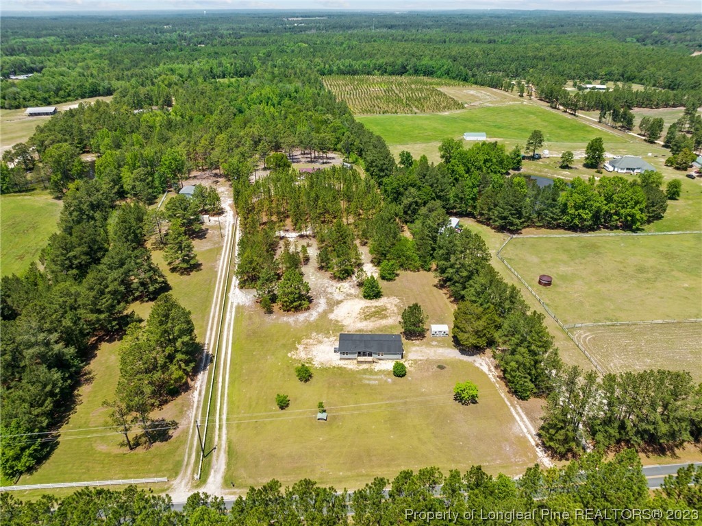 1770 Ashemont Road Aberdeen, NC 28315 - Photo 4 of 29 an aerial view of residential houses with outdoor space and trees all around