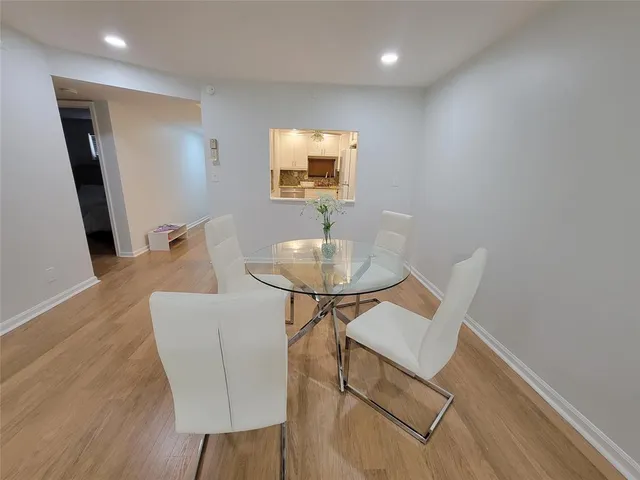 a workspace with furniture and wooden floor