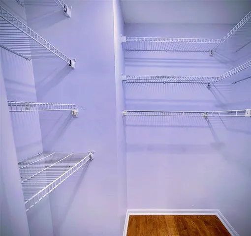 a bathroom with a shower and a bathtub