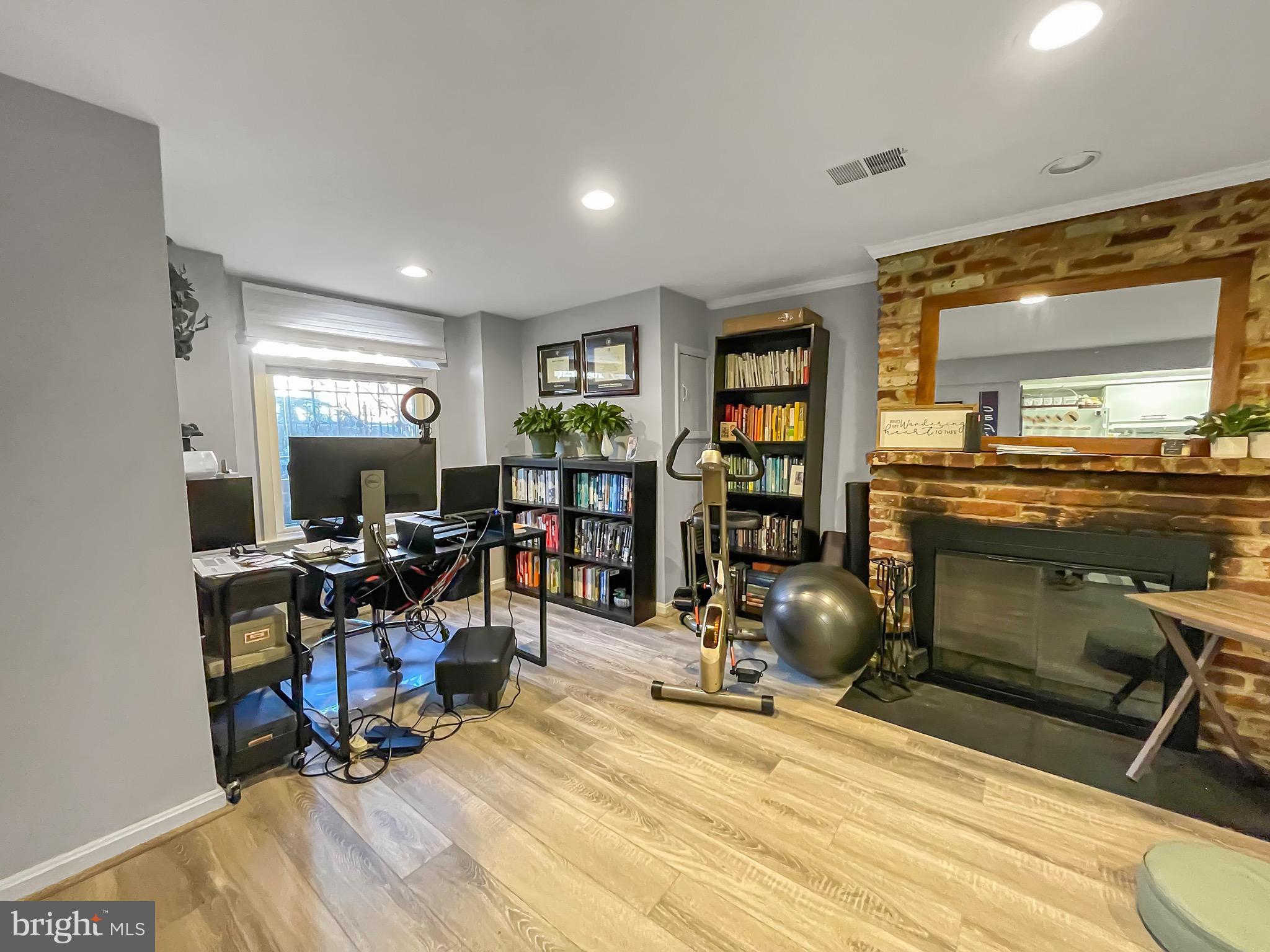 323 E Street Northeast Washington, DC 20002 - Photo 36 of 84 Living room w/ wood-burning FP