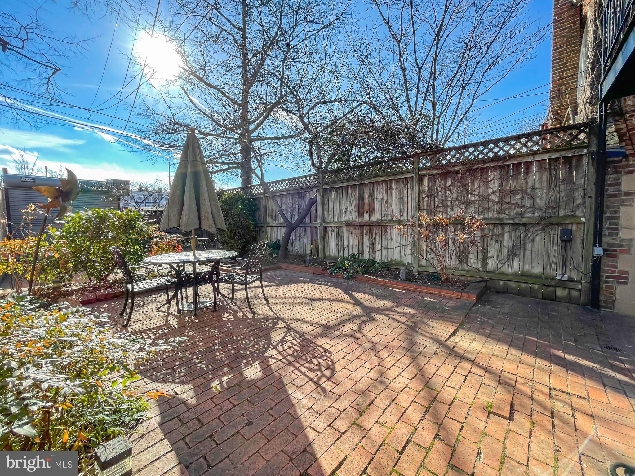 323 E Street Northeast Washington, DC 20002 - Photo 51 of 84 Lovely rear yard w/ water feature & brick paving