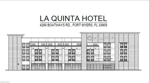 a black and white photo of a bench