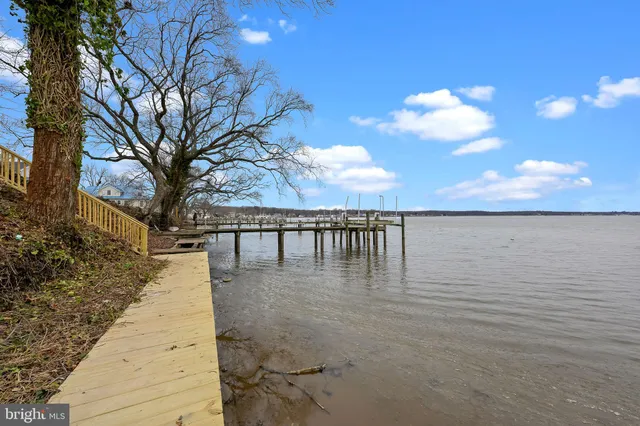 a view of a lake with a yard