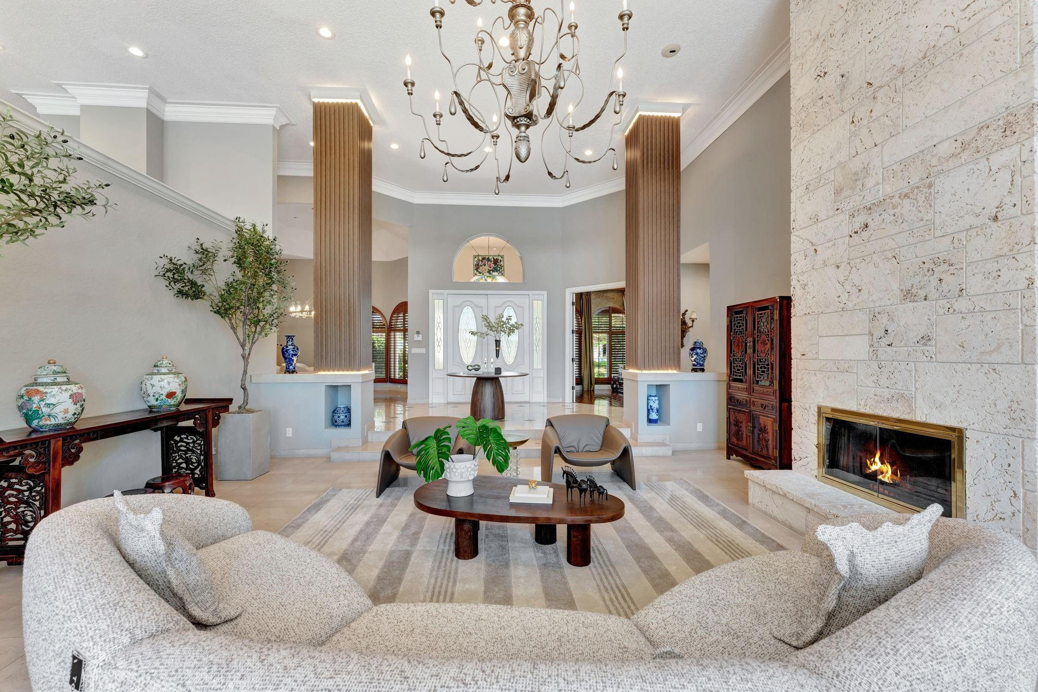 3460 Windmill Ranch Road Weston, FL 33331 - Photo 14 of 75 a living room with furniture fireplace and a potted plant