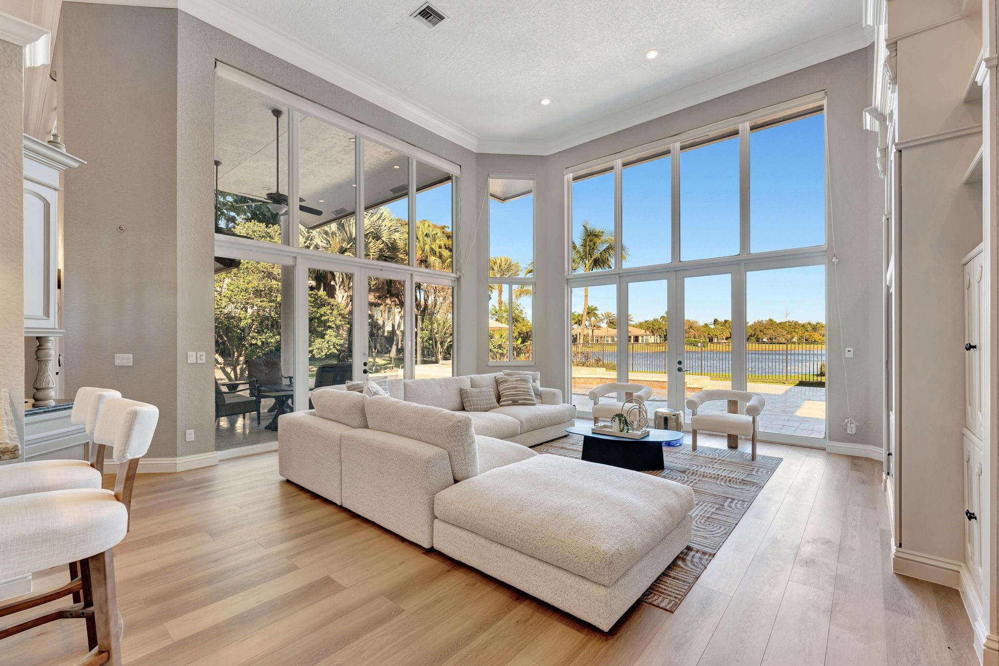 3460 Windmill Ranch Road Weston, FL 33331 - Photo 18 of 75 a living room with furniture and a large window