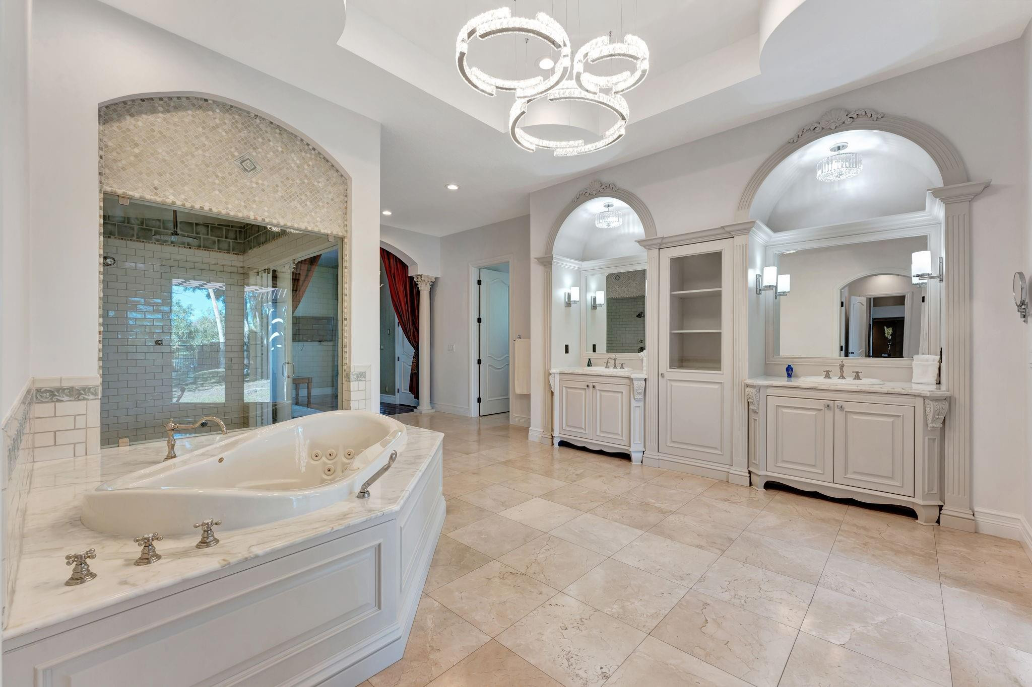 3460 Windmill Ranch Road Weston, FL 33331 - Photo 35 of 75 a large spacious bathroom with a large tub and shower