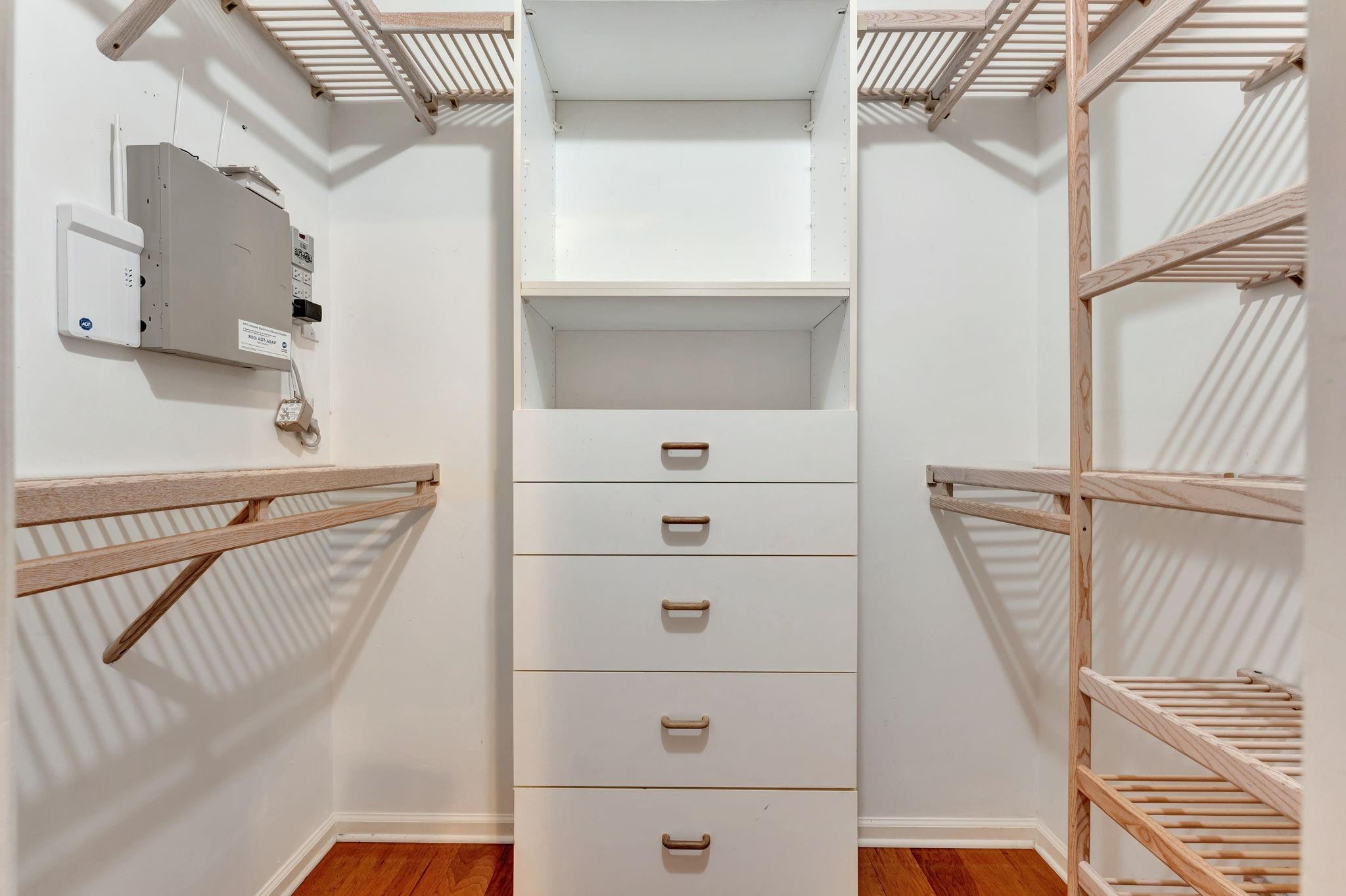 3460 Windmill Ranch Road Weston, FL 33331 - Photo 50 of 75 a view of walk in closet with empty racks