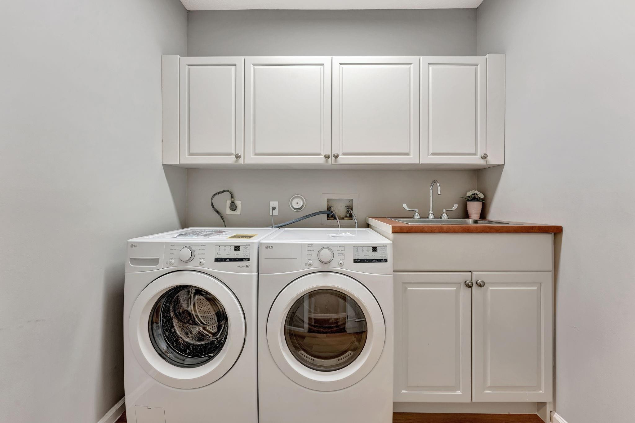 3460 Windmill Ranch Road Weston, FL 33331 - Photo 59 of 75 a utility room with dryer and washer