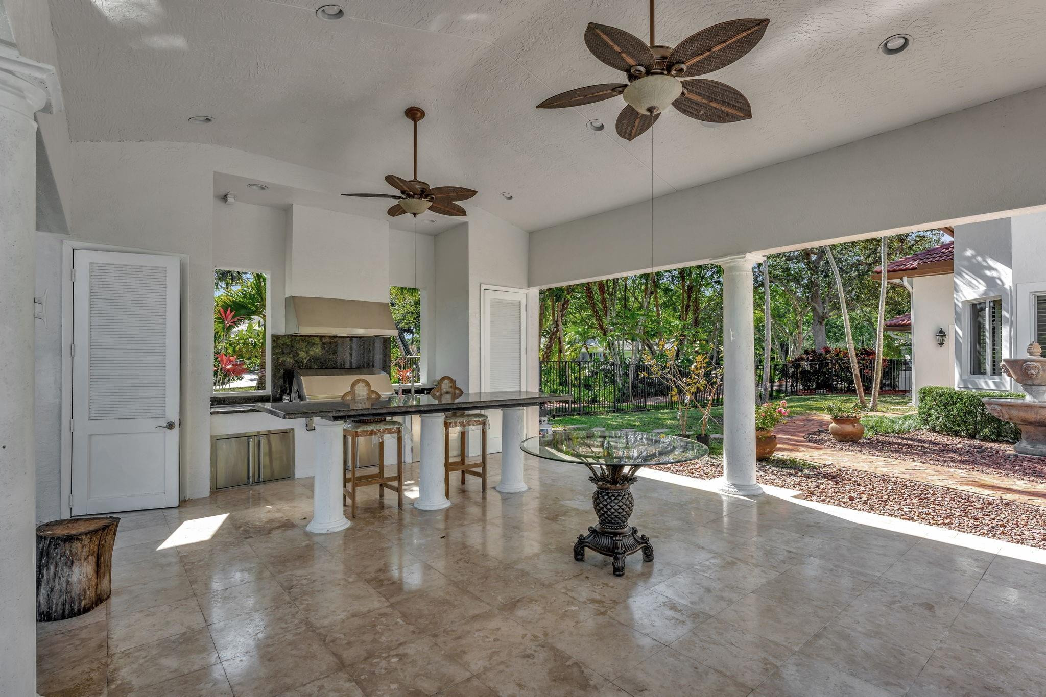 3460 Windmill Ranch Road Weston, FL 33331 - Photo 60 of 75 a view of a dining room with furniture window and outside view