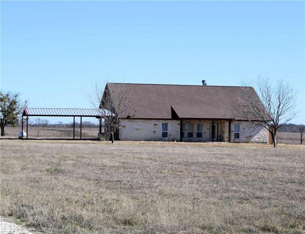 144 County Road 151 Riesel, TX 76682 - Photo 15 of 50 a view of a house with a outdoor space