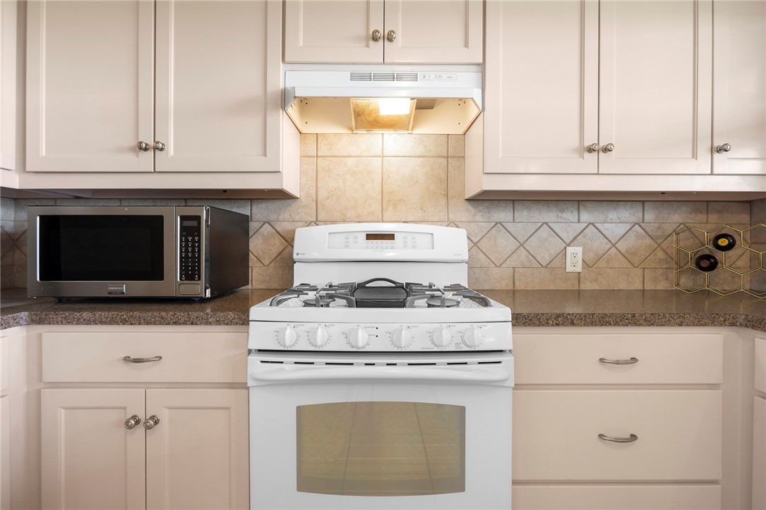 144 County Road 151 Riesel, TX 76682 - Photo 23 of 50 a stove top oven sitting inside of a kitchen