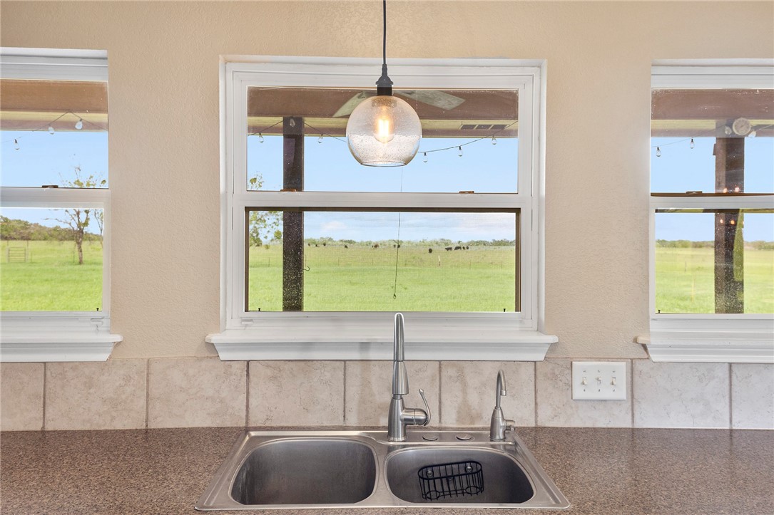 144 County Road 151 Riesel, TX 76682 - Photo 24 of 50 a kitchen with a sink and a window