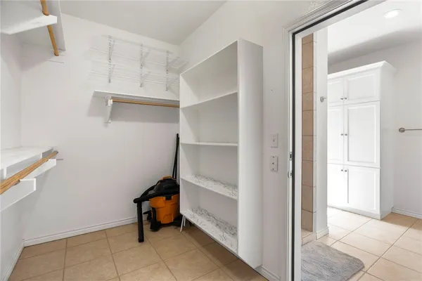 a room with storage and utility