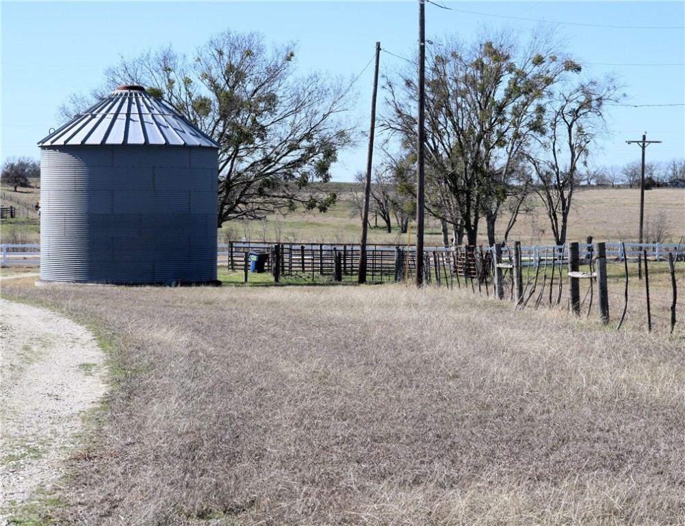 144 County Road 151 Riesel, TX 76682 - Photo 48 of 50 a front view of a house with a yard and fountain