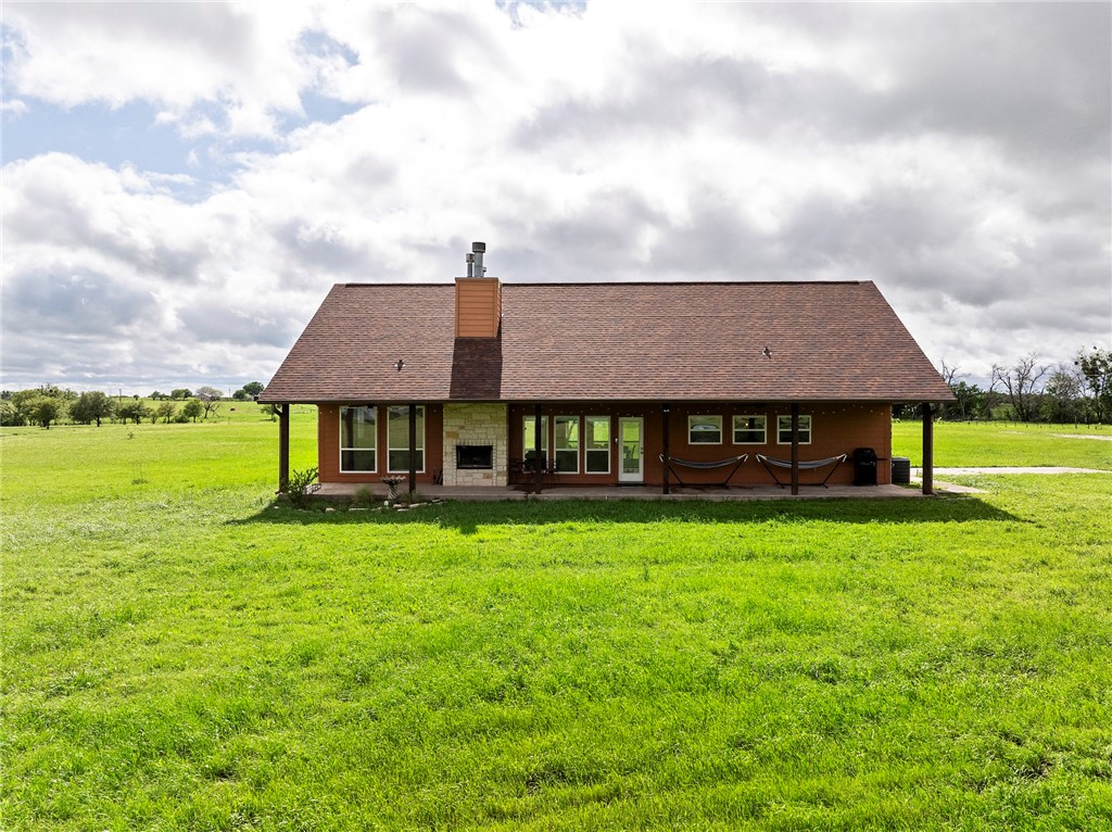 144 County Road 151 Riesel, TX 76682 - Photo 7 of 50 a view of a house with a yard