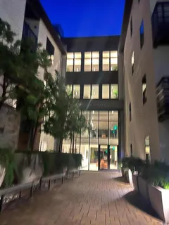 a view of a house with a porch and furniture