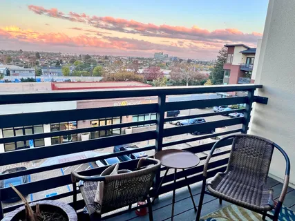 a view of a chairs and table in the terrace