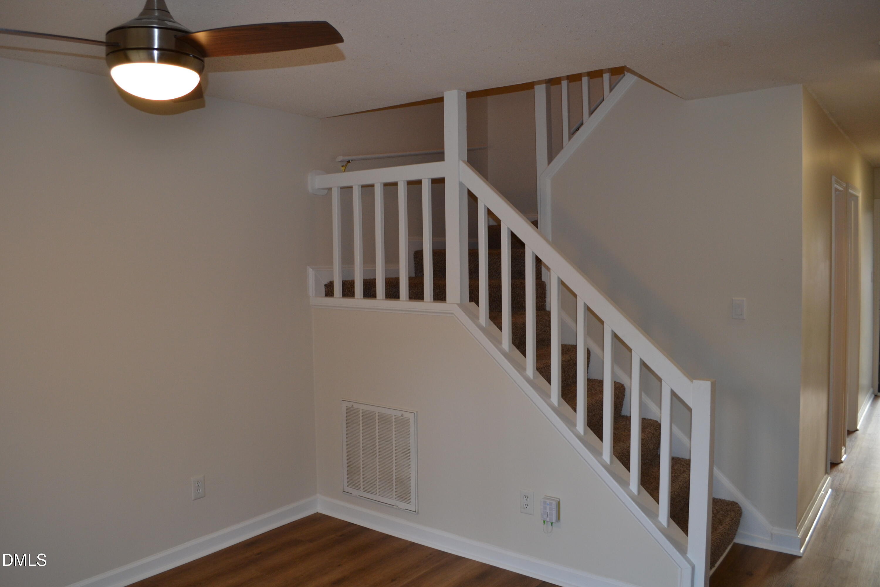 4018 The Oaks Drive Raleigh, NC 27606 - Photo 33 of 49 a view of an entryway with wooden floor